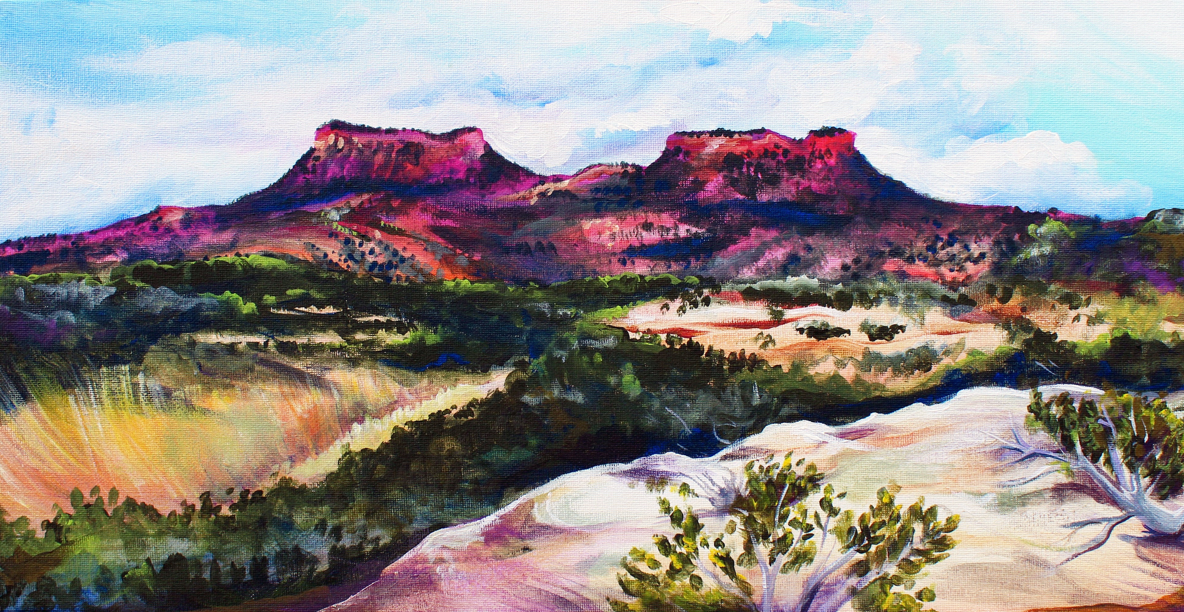 Painting of a desert landscape with red rock formations and greenery.