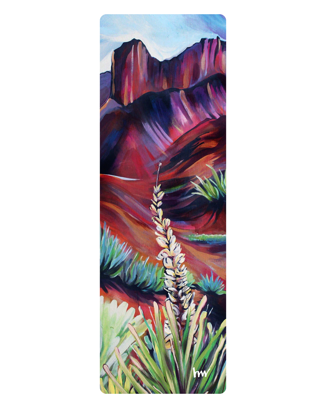 Yoga mat with a colorful desert landscape design featuring mountains and cacti.
