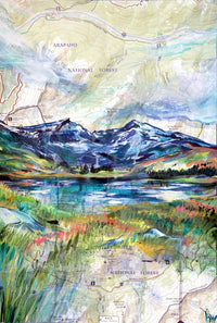 Painting of a colorful mountain with a reflective pond in front of it, on a topographical map.