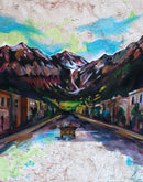 Painting of a mountainous landscape with a street and buildings.