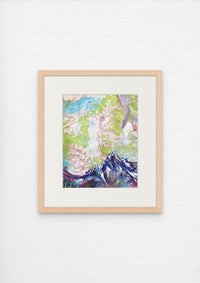 A map art print featuring a topographic representation of Twilight Peak in the San Juan Mountains, Colorado framed on a white wall.